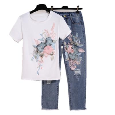 China Anti-pilling summer fashion ladies suit embroidered sequins three-dimensional flower short-sleeved T-shirt + hollow nine-hundred jeans for sale