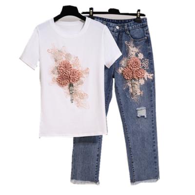 China Summer women's anti-pilling two-piece suit embroidered flower three-dimensional hanging flower short-sleeved T-shirt + hollow nine-hundred jeans for sale