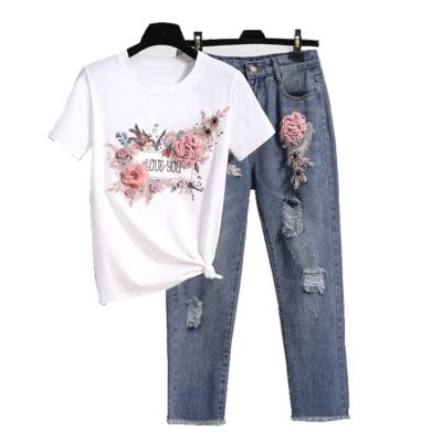 China Anti-pilling 2021 summer suit women's short-sleeved printed T-shirt new by stereo swallow Stud-beaded two-piece + Hole-punched jeans Nine-hundred for sale