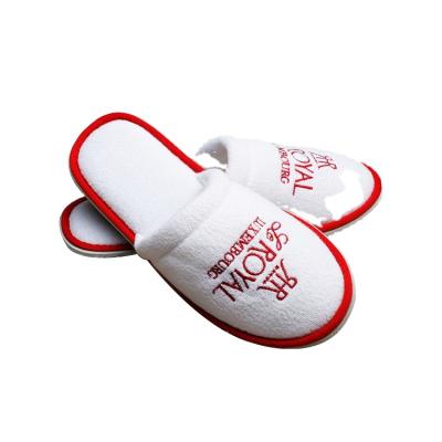 China Narrow Toe Customized OEM Closed Toe EVA Sole Man Women Embroidered Velvet Guest Hotel Disposable Slippers for sale