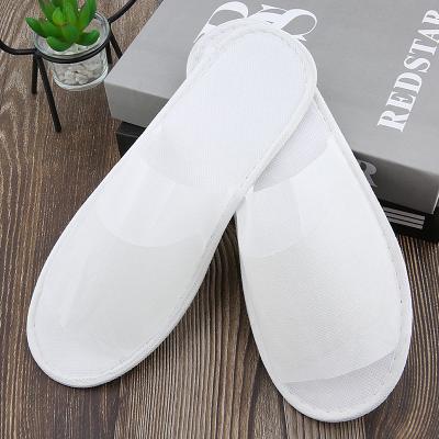 China Comfortable Custom Wholesale Portable Adult Travel Class Disposable Cotton Guest Room With Logo White Hotel Slippers for sale