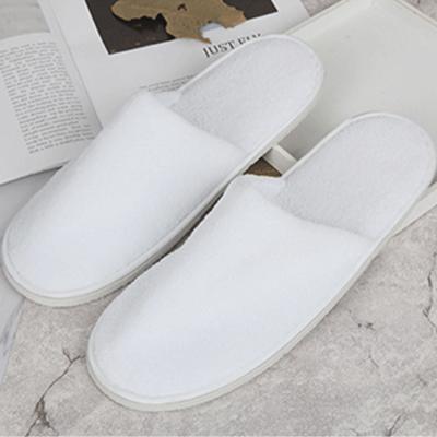 China Soft Custom Factories Travel Guest Soft White Open Toe Soft Room Use Unisex Disposable Hotel Slippers Reusable for sale