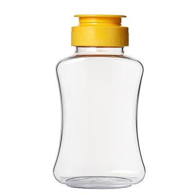 China Luxury Premium Plastic Squeezable Plastic Squeezable Pet Honey Cap Honey Small OEM Silicone Food Packing Bottle Jar Dispenser for sale