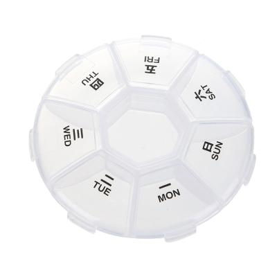 China Classic 7 Days and 7 Grids Around Rotating Transparent Pill Box Mini One Week Fructose Pill Creative Portable Storage Box for sale