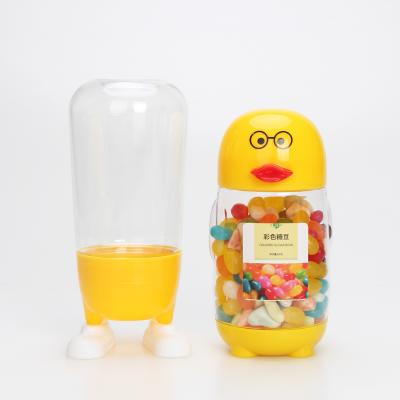 China Cute Plastic Snack Bottle Suppliers 300Ml 290Ml Honest Popular Honest Upside Sealed Footed Cookie Containers Shape Candy Jars for sale