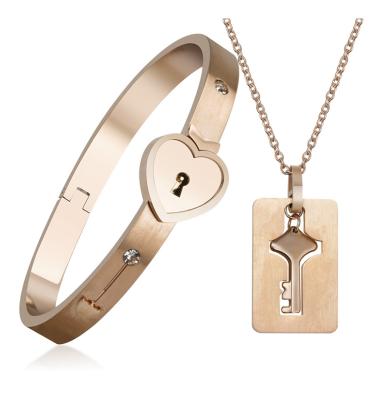 China CLASSIC Concentric Key Lock Stainless Steel Fashion Couples Bracelet Pendant Necklace For Anniversary Gift for sale