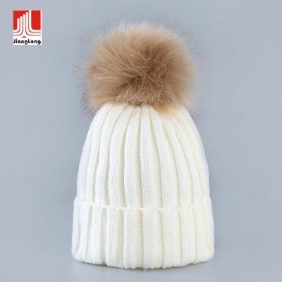 China COMMON Fashion Custom Made Hat Pom Warm Winter Beanie Knitted Faux Fur Logo Textured Solid Color Ribbed Embroidery for sale