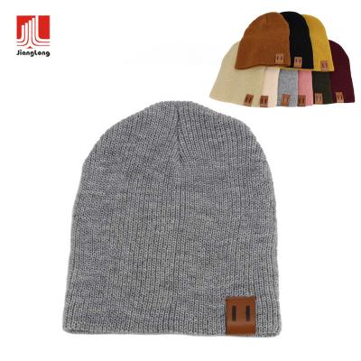 China COMMON Fashionable Custom Embroidery Logo Mommy And Me Solid Ribbed Color Winter Warm Beanie Knitted Hat for sale