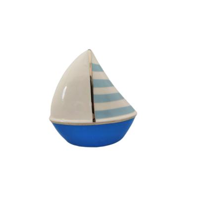 China Fashion Durable Top Grade Creative Ceramic Piggy Bank Modern Sailboat Shape Piggy Bank For Kids for sale