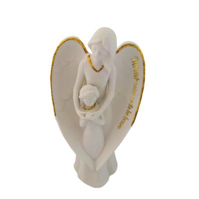 China Europe Low Price Good Quality Simple White Ornament Ceramic Angel Holding A Girl Standing Desk Decoration for sale