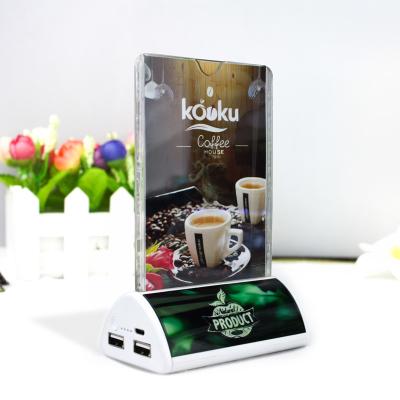 China Advertising Power Station With Cable Coffee Shop Restaurant Dual Power Bank Charger for sale