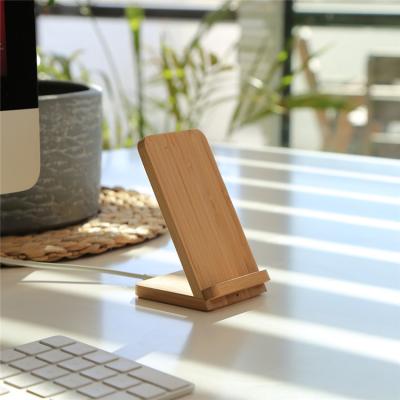 China Eco-friendly Bamboo 10W 15W Wireless Charger With Phone Holder For All Phones Wireless Charging Station for sale