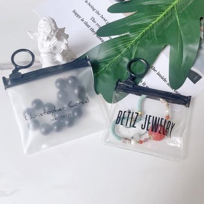 China Custom Logo Mini Jewelry Pouch Bag Small PVC Fashion Zipper Packaging Zipper Moisture Proof Lock Plastic Earring Pouch Earring Bag With Printed for sale