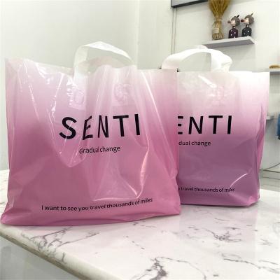 China New Design Plastic Buckle Handle Soft Plastic Bag BIODEGRADABLE Soft T-shirt Clothing Carry Shopping Bag With Own Poly Logo for sale