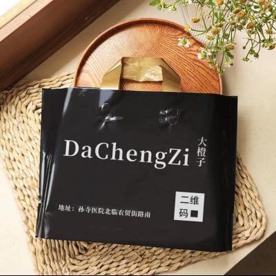 China Custom Logo Printed Clothing Packaging Shopping PE Plastic Ploy Bag BIODEGRADABLE Promotional With Soft Loop Handle for sale