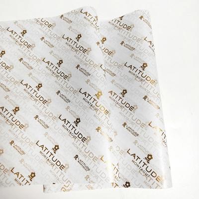 China Recycled Materials Gold Logo Printed Wrapping Tissue Packaging Luxury Custom Paper For Gift Apparel. Eco-friendly wrapping paper for sale