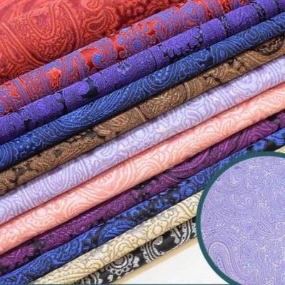 China Sustainable Bandanna Jacquard Fabric For Dress Fashion Site Rose Jacquard Fabric 3D Pattern Jacquard Fabric for sale