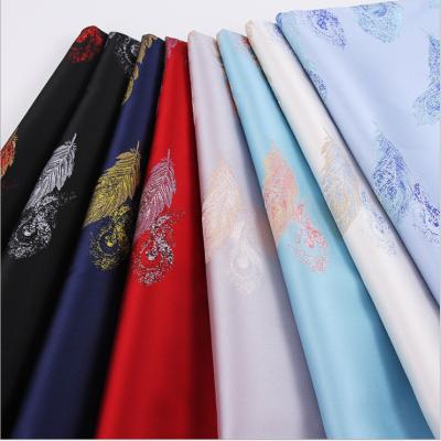 China SUSTAINABLE POLYESTER AND NEW METALLIC DESIGN WOVEN BROCARD JACQUARD FABRIC FOR GARMENT for sale