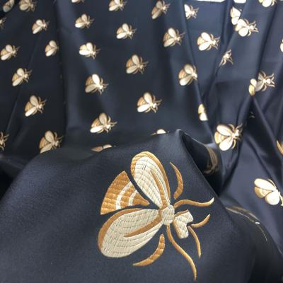 China Metallic Hornet Jacquard Fabric For Dress Fashion Jacquard Fabric 3D Pattern Jacquard Fabric for sale