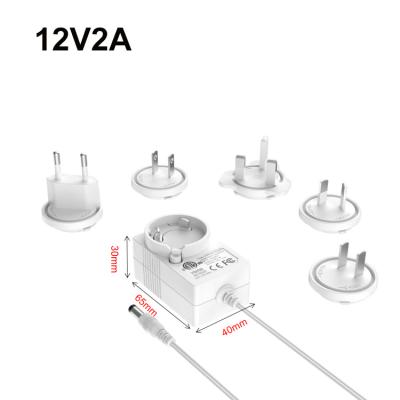 China Electrical Appliances 24v1a 12v 2a AC Adapter 24w Power Supply DC Switching Interchangeable Adapter for sale