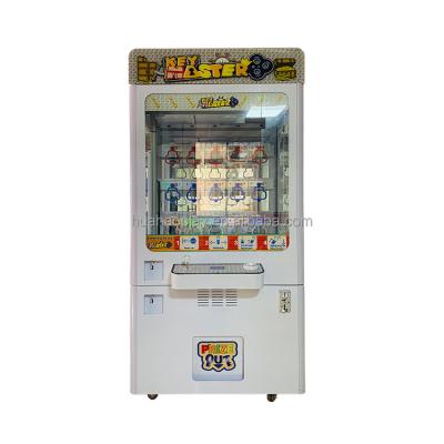 China Metal+Plastic 15 Holes Coin Pusher Operated Key Game Machine Master Key Game Machine Pushing Victory Master Toy Crane Master Machine for sale