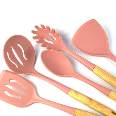 China Viable Hot Selling Silicone Kitchen Utensil Set With Wooden Or Black Walnut Rubber Wood Handle Cookware Cookware Set for sale