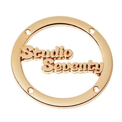 China Letter Apparel Viable Waterproof Hollow Metal Tags Accessory Gold Plated Round Logo Brand Metal Label Plate For Bikini for sale