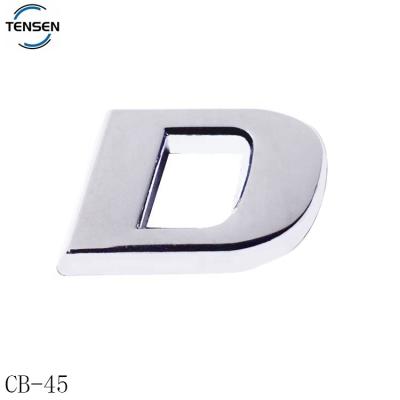 China Europe Die Casting Private Label Car Accessories Chrome Embossed Plating Letter Alloy Car Nameplate With Sticker for sale