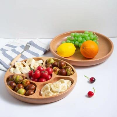 China Sustainable Fruit plate dry fruit teay light luxury household wooden living room with sub-grid round tray for sale