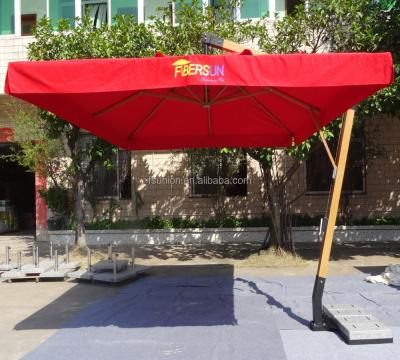 China Guangzhou Outdoor Red Fiberglass Furniture Hanging Umbrella With Drapery And Granite for sale