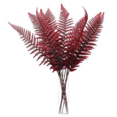 China Artificial Palm Leaf Flower Arrangement Home Accessories Indoor Outdoor Artificial Pine Branch Decoration Wedding Decoration for sale