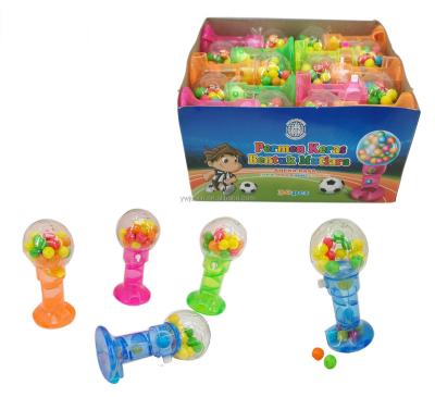 China Capsule Toys Wholesale Soft Kids Toys With Mini Candy Spinner Candy Girls Toys Football Dispenser for sale