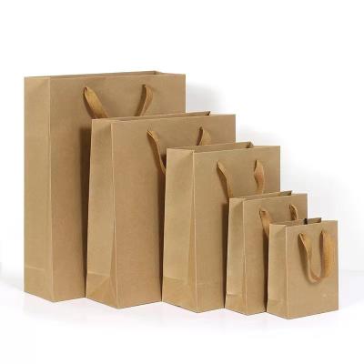 China Recyclable Custom Printed Your Own Logo Wholesale Brown Kraft Craft Paper Shopping Bag for sale