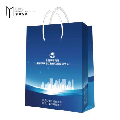 China Low Price Recyclable Tote Bag Custom Logo Printing Shopping Paper Handbag For Corporate for sale