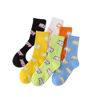 China New antibacterial couples unisex cotton sports and colorful leisure letter long tube crew socks for girls and women for sale