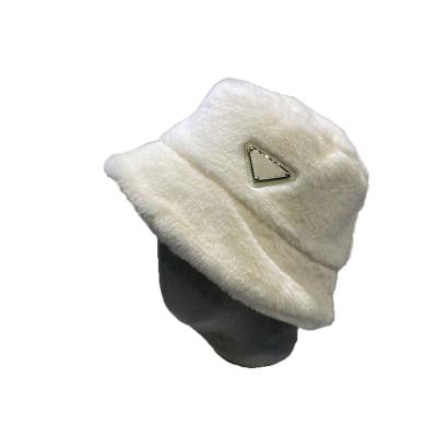 China Image Hot selling high quality designer bucket hat luxury winter fur bucket hat for women warm designer caps wholesale for sale