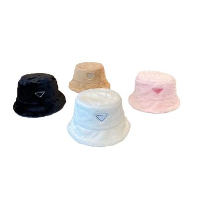 China Hot New Style Fashion Bucket Hat Brands Luxury Famous Designer Bucket Hat For Women Winter Furry Hats Wholesale for sale