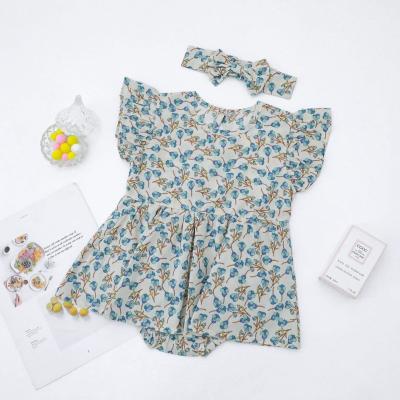 China Floral Print Fashionable Soft High Quality Babies' Ruffle Sleeveless 100% Baby Rompers With Headband Baby Clothes Newborn for sale