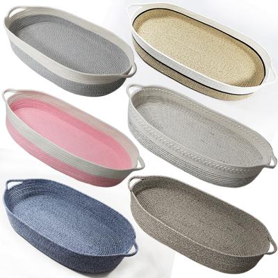 China Modern High Quality Foldable Oval Woven Cotton Rope Baby Basket Mose Nursery Storage Handmade Baby Changing Carry Basket With Handle for sale