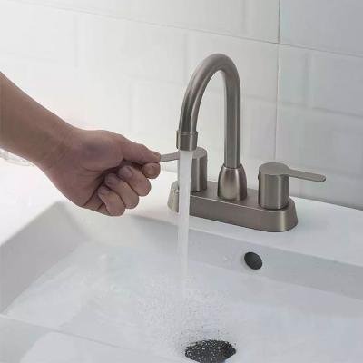 China Metered Faucets 1080 Degree Swivel 304 3 Hole Mixer Water Taps Stainless Steel Basin Faucets For Bathroom Sink for sale