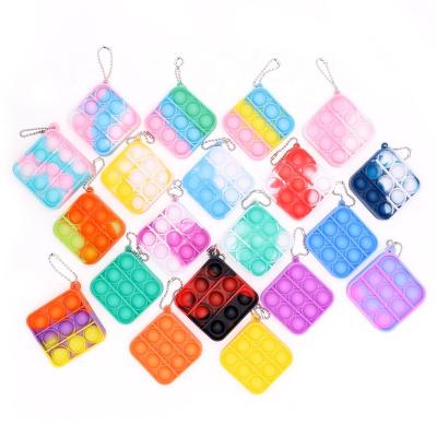 China Sress reliever toys hot selling noise stir to heart itting toys doll key chain snap noise figet key chain toy key chain purse bag for sale