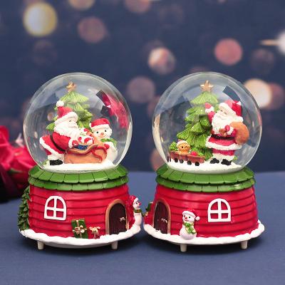 China 100mm Europe Christmas Snow Globe With Water 8 Snowball Santa Claus Snowman Music Box music and color lights music for sale