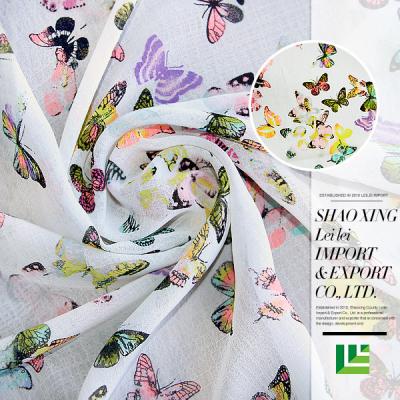 China Butterfly anti-static printing design new arrival soft lght texture woven chiffon polyester fabric for dress for sale