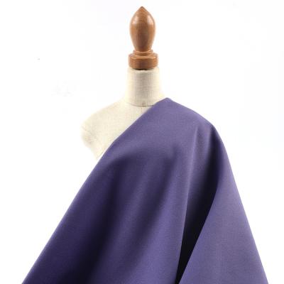 China Anti-static Girls Clothings Medium Weight Factory Price Crepe Fabric Purple Elegant Polyester For Dress for sale