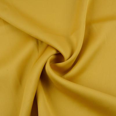 China Anti-Static Professional Supply Elegant Heavyweight Charmeuse Polyester Fabric For Clothing for sale