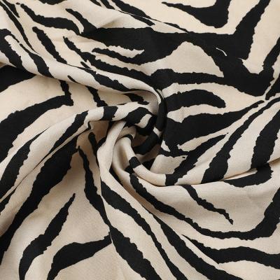 China Anti Static Warmers Stripes Lines Zebra Design Printed 100% Rayon Fabric For Women Dress for sale