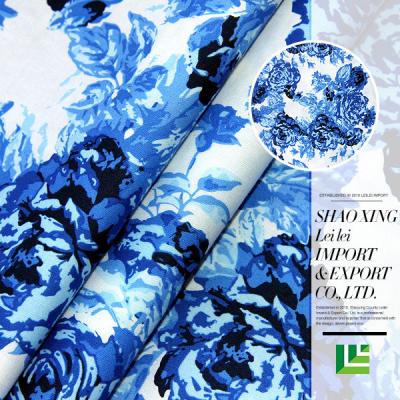 China 2021 new design viable comfortable blue peony woven printed cotton fabric for dress for sale