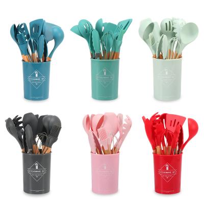 China Food Grade Silicone 12pcs Sustainable Wooden Handle Kitchen Utensil Set Kitchen Accessories Silicone Cookware Set for sale