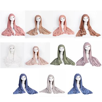 China Simple solid color Wholesale Jersey Muslim Sequin Solid Color Tudung Bawal Scarf Islamic Prayer Abayas hijab Robe For Women for sale