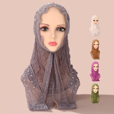 China Simple solid color New Design Women's Long Scarf Solid Color Malaysia Muslim Clothing Scarf Girls Polyester With Rhinestone Tassel Hijab for sale